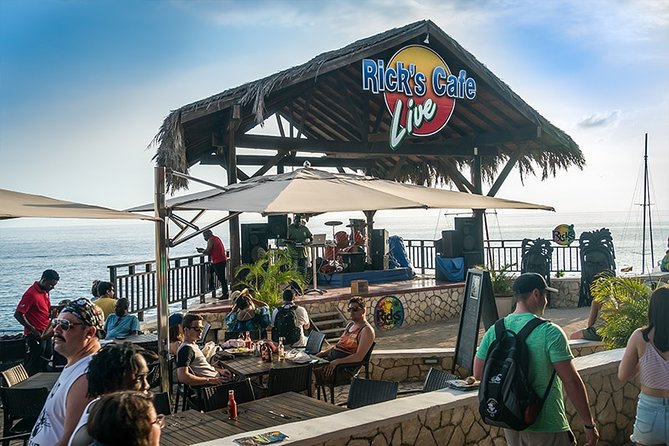 4. Negril Full-Day Guided / Sunset Tours 7miles Beach Blue Hole & Ricks Café - Rick’s Cafe and the sunset finish