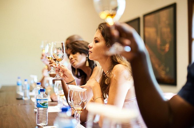 Appleton Estate Rum Tour and Tasting from Negril - Tasting rum with fresh sugar cane juice