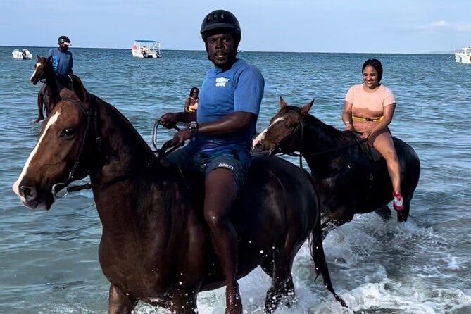 ATV , Bamboo Rafting & Horseback Ride Tour From Montego Bay - Riding an ATV through Jamaica’s countryside