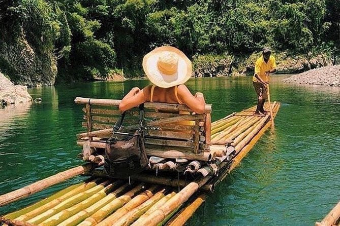 Authentic Jamaican Bamboo Rafting Tour from Montego Bay - Boarding a 30-foot bamboo raft