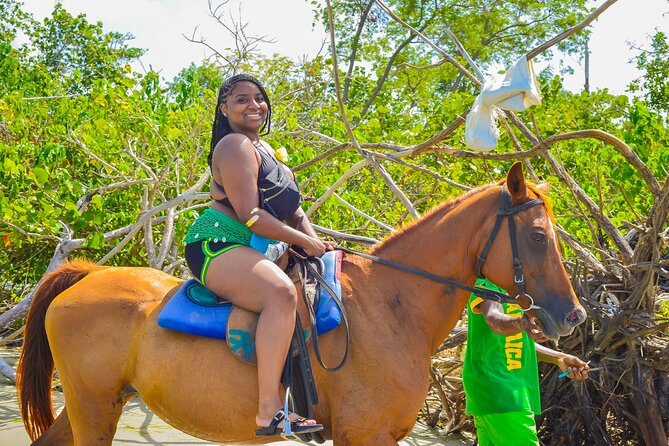 Bamboo Rafting and Horseback Riding Tour Montego Bay Jamaica - Booking, weather, and cancellation details