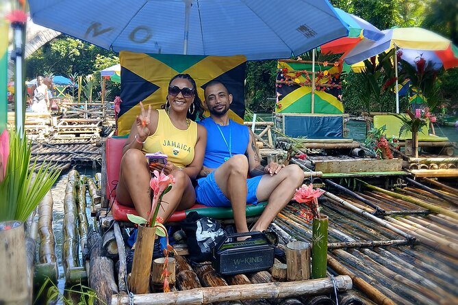 Bamboo Rafting Experience with Limestone Massage - Boarding the 30-foot raft on the Great River