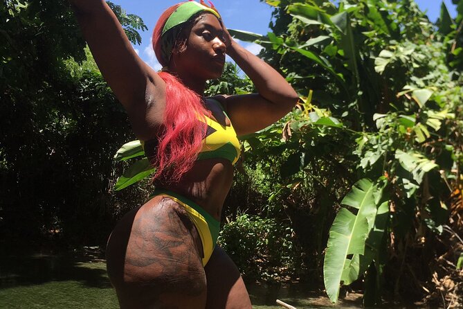 Bamboo River Rafting Experience from Ocho Rios - Getting onto a traditional bamboo raft
