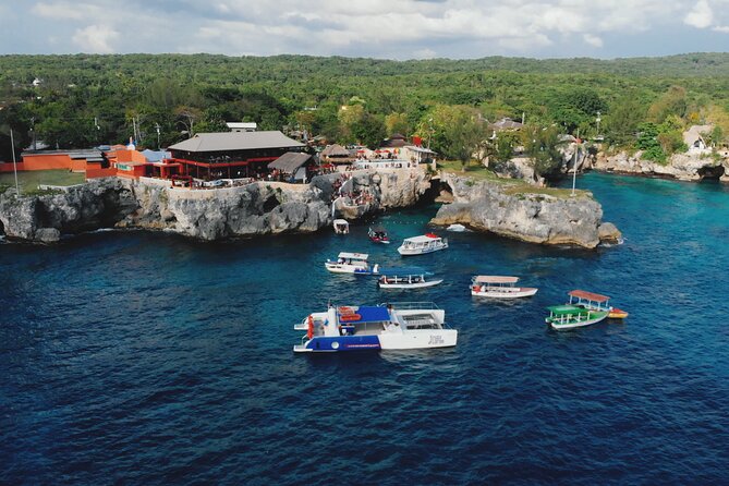 Bamboo River Rafting with Negril Ricks Cafe Visit - Margaritaville and Seven-Mile Beach