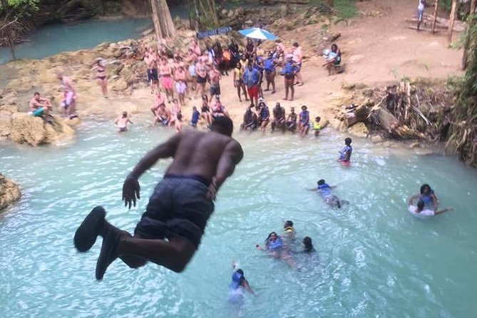 Blue Hole and Sightseeing Tour from Falmouth - Stop two: Waterfalls, cave, and rope swing