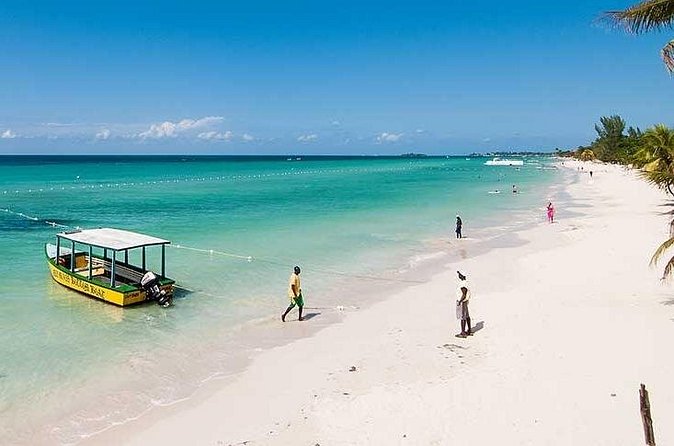 Blue Hole Mineral Spring, Ricks Cafe, 7 Mile Beach and Shopping Private Tour - Times Square Mall for a practical shopping break