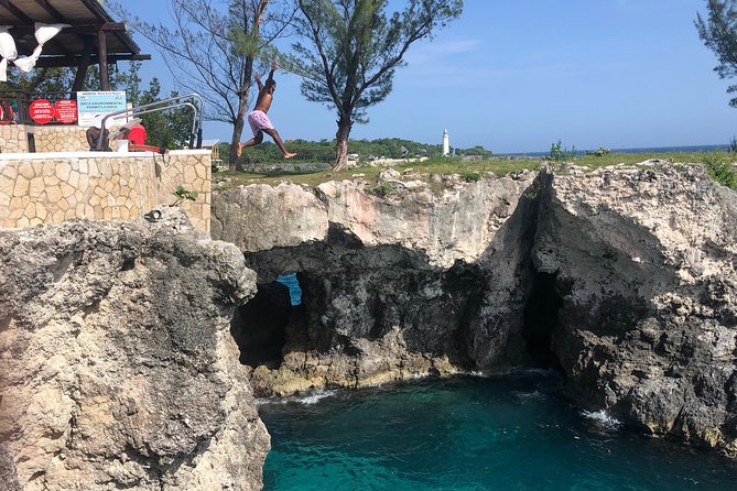 Blue Hole Mineral Springs, Rick's Café, and Shopping Combo Tour - Rick’s Café, cliff views, and sunset time