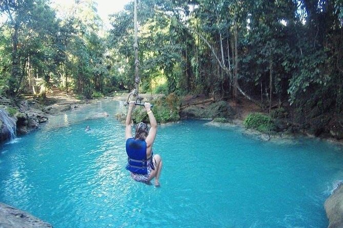 Blue Hole Secret Falls and River Tubing Tour - What $153.85 buys you