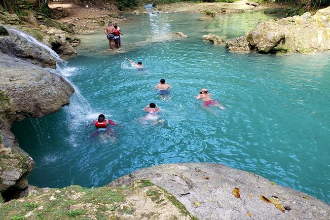 Blue Hole & Secret Falls Day-Trip with Shopping from Grand Palladium - Guides can shape the whole day
