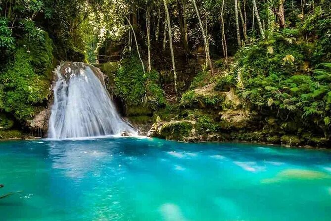 Blue Hole, Secret Falls & River Rapids Tubing from Montego Bay - White River tubing builds from calm to fast