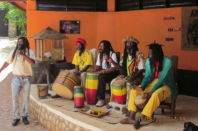 Bob Marley's Nine Mile Day-Trip with Admission & Guided Tour from Falmouth - A quick stop at Columbus Park in Discovery Bay
