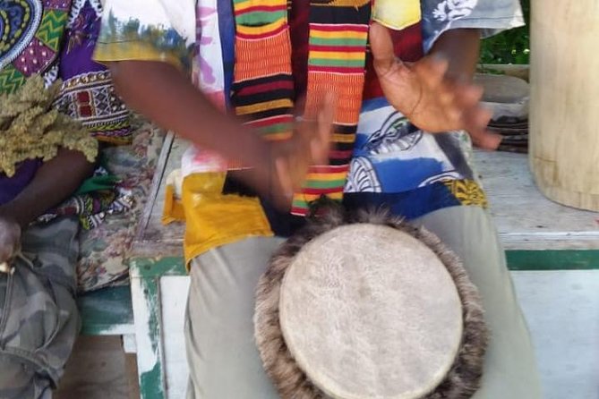 Bob Marley's Nine Mile & Dunns River Falls Tour: Transportation & Ticket - What the guide adds between the stops