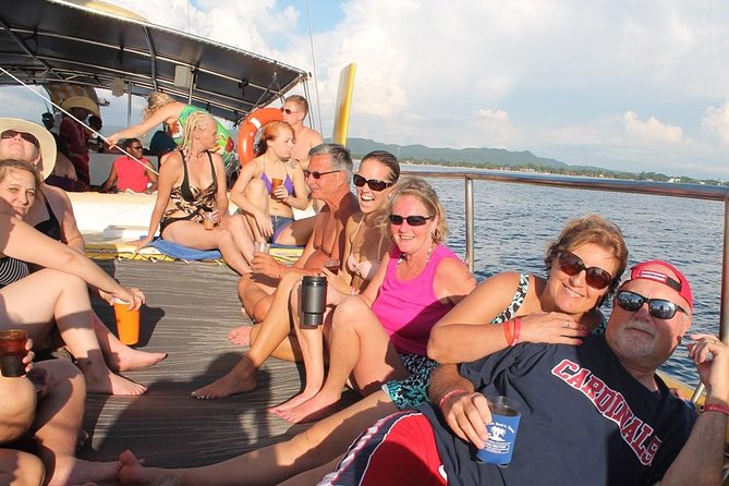 Catamaran Cruise Full Day Tour to Reef, Caves and Negril Beach - Snorkeling over reef and tropical fish