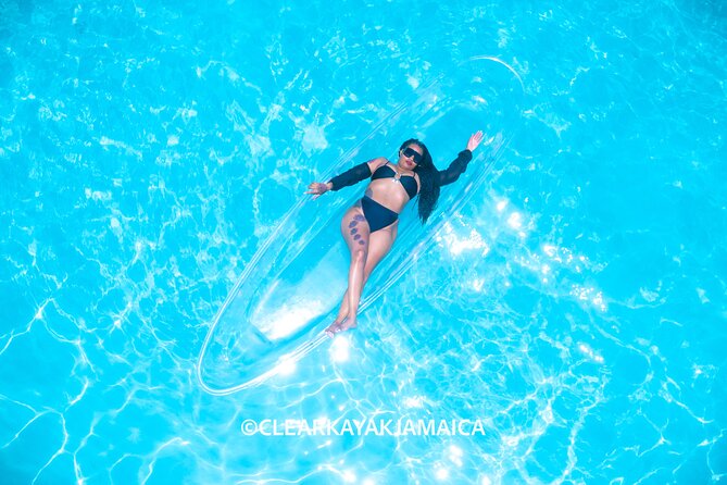 Clear Kayak Drone Video & Photoshoot near Ocho Rios Jamaica - Posing while the drone works overhead