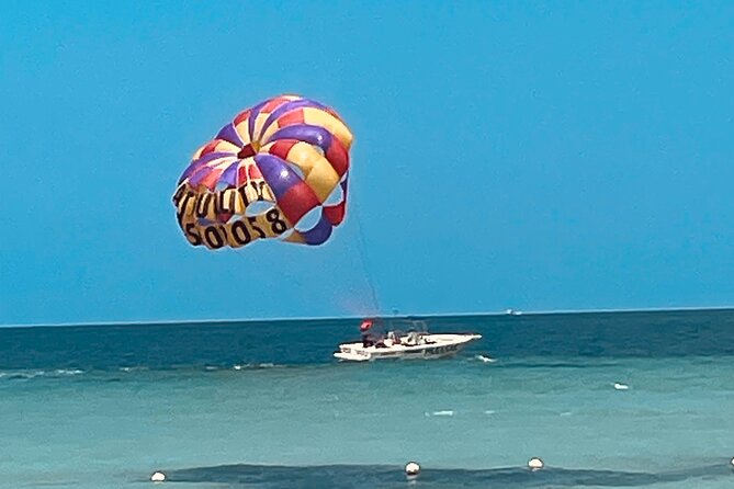Customized Parasailing & JET-SKI - Who will get the most from this outing