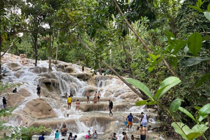 Dunn River Falls and Bamboo River Rafting in Ocho Rios Jamaica. - Drifting along the White River on bamboo