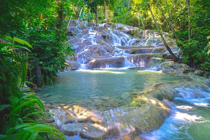 Dunn's River Falls , Bamboo Rafting & ATV Ride from Montego Bay - Three Jamaican highlights in one private day