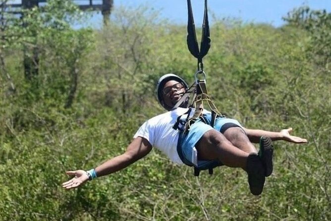 Dunn’s River Falls,Zip lining & horseback riding Combo tour from Montego Bay - Climbing Dunn’s River Falls with a guide