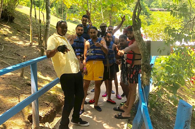 Explore Montego bay Jamaica toMartha Brae Rafting &Blue Hole Tour - Swimming, rope swings, and falls jumping at Blue Hole