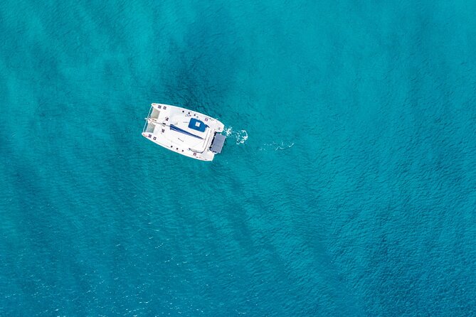 Family Catamaran Cruise from Jamwest Beach Negril Hotels - Reaching Rick’s Cafe for the sunset