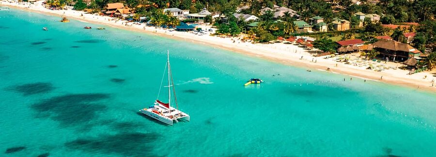 From Montego Bay/Falmouth: Negril Beach Catamaran Cruise - Boarding the catamaran near Negril