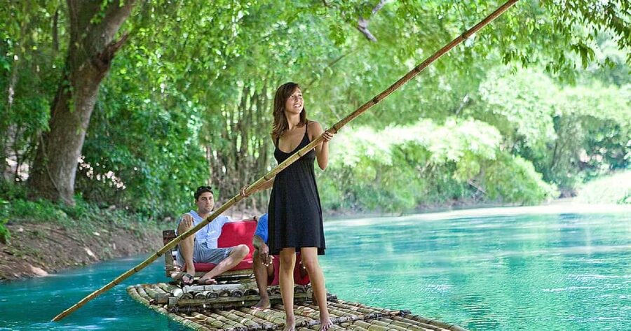 Jamaica: Bamboo Rafting on the Martha Brae - Settling onto a two-seat bamboo raft