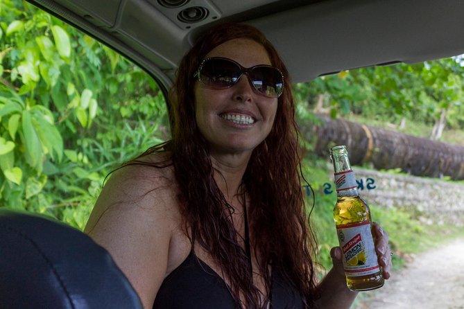 Jamaica Foodie and Cultural Experience & Konoko Falls Ocho Rios - Sampling coconut, sugarcane, and market produce