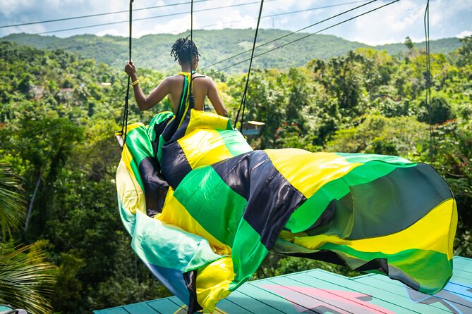 Jamaica Swing Drone Photoshoot with Dress Lunch and Transport - A mountaintop swing with a Bali-inspired look