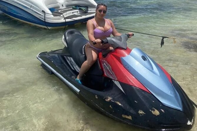 Jet Ski/ Parasailig Water Activity in Montego Bay Jamaica. - Getting ready with a safety talk and life vest