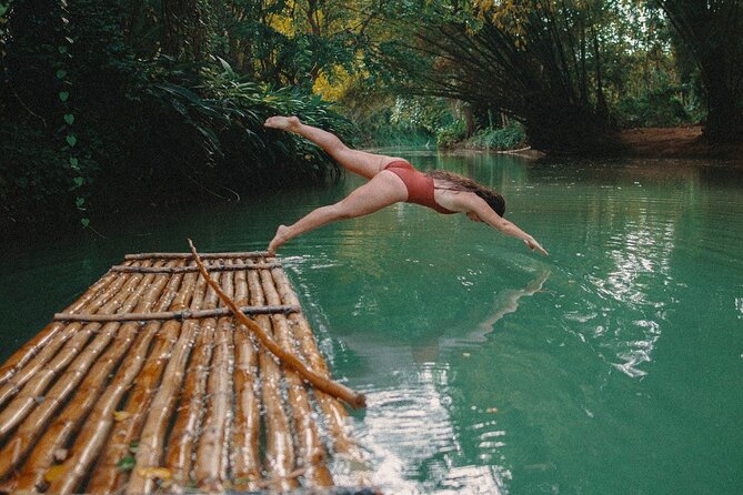Martha Brae Rafting from Montego Bay with Private Transportation - Boarding a 30-foot bamboo raft