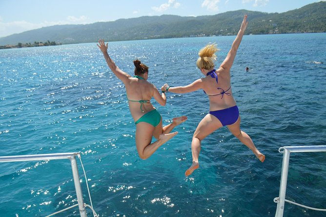 Montego Bay Catamaran Cruise and Snorkeling Tour from Falmouth - Margaritaville adds slides instead of a quiet sandbar