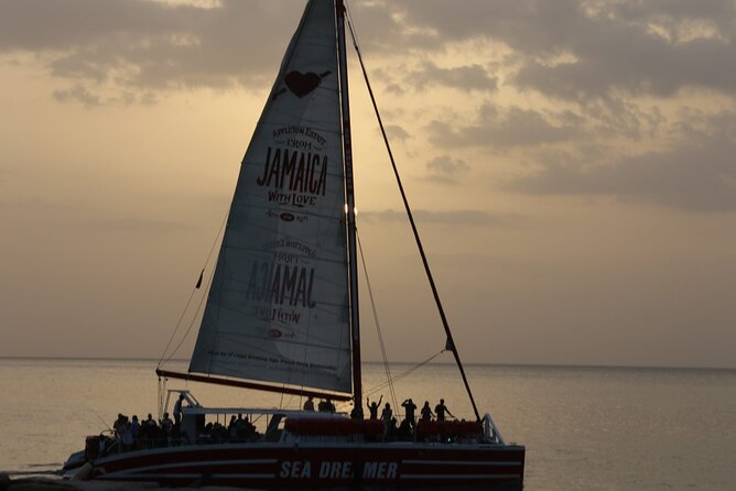 Montego Bay Catamaran: Snorkel Tour with Open Bar & Reggae DJ - Foot massages and Jamaican dance lessons