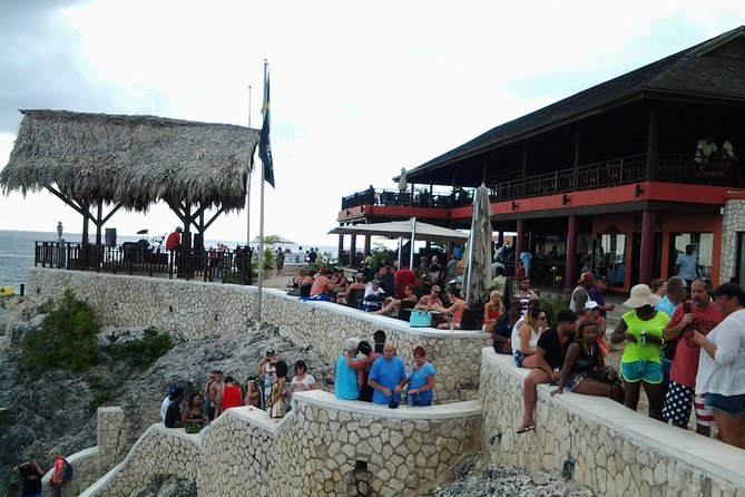 Montego Bay Excursion Negril 7 Miles Beach, Rick's Cafe and Time Square Shopping - Stretching out on Negril’s 7-Mile Beach