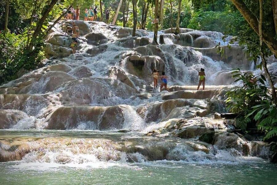 Montego Bay: Private Dunn's River Falls and Blue Hole Tour - Climbing the 600-foot Dunn’s River Falls