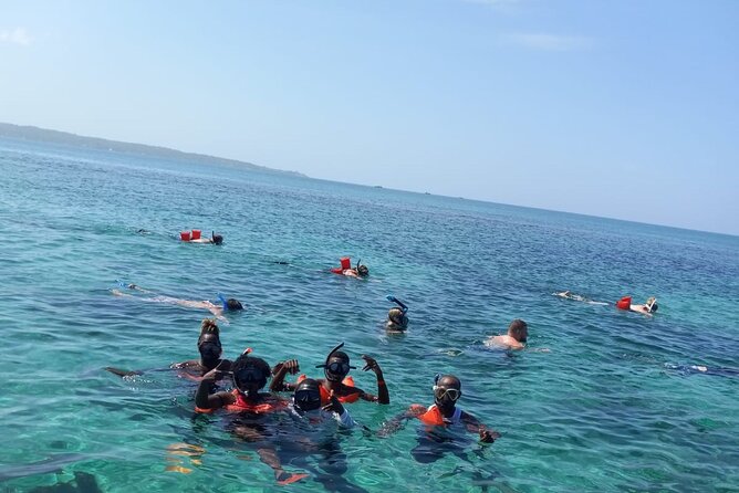 Negril Glass Bottom Boat Tour Snorkeling and Booby Cay - Group size, guides, and the overall mood