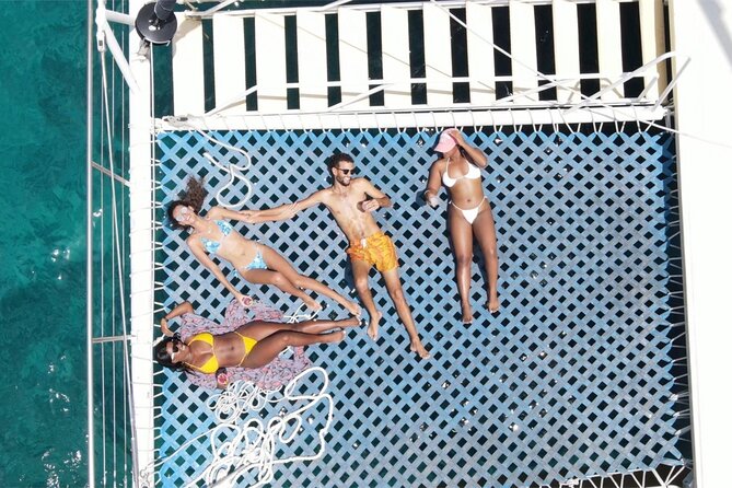 Negril PRIVATE CHARTER Catamaran (rate for 21 persons) - Snorkeling near coral gardens and swimming caves