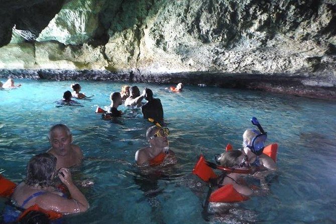 Negril Ricks cruise PLUS Booby Cay Lobster & Cave Snorkeling - Fresh fire-coal cooking on Booby Cay