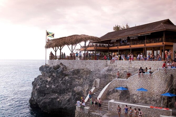 Negrils Seven Miles Beach, Rick's cafe and Parasailing Tour. - From Montego Bay to Negril by road