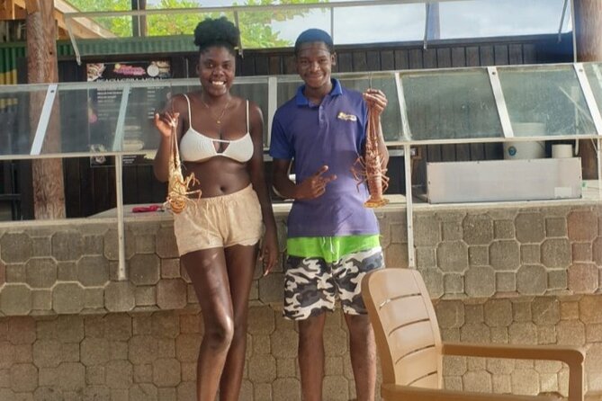 Negrils Seven Miles Beach, Rick's cafe and Parasailing Tour. - Rick’s Cafe and Negril’s cliff jumpers