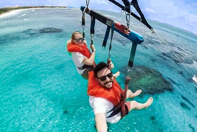 Parasailing above Turquoise Ocean Waters in Montego Bay - The ride from your resort to the water