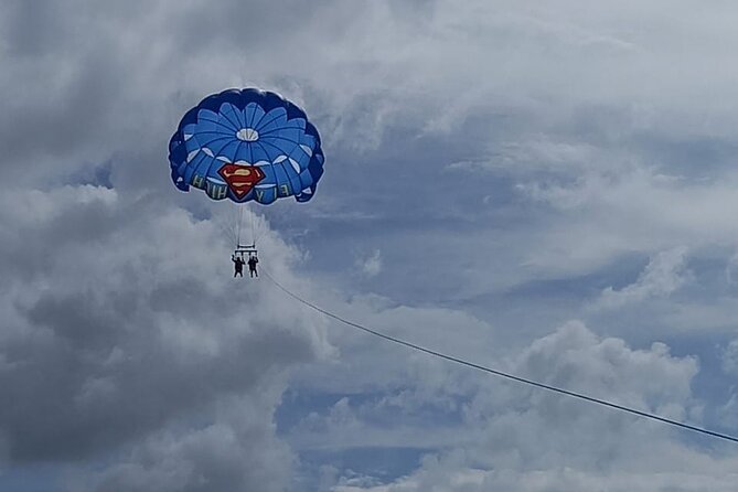 Parasailing, Blue Hole Mineral Spring, Seven Mile Beach - Seven Mile Beach, with room to choose your pace