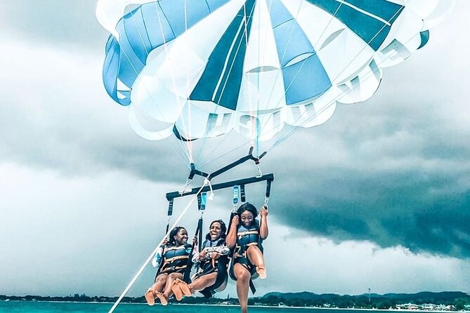 Parasailing, Blue Hole Mineral Spring, Seven Mile Beach - Weather, cancellation, and timing