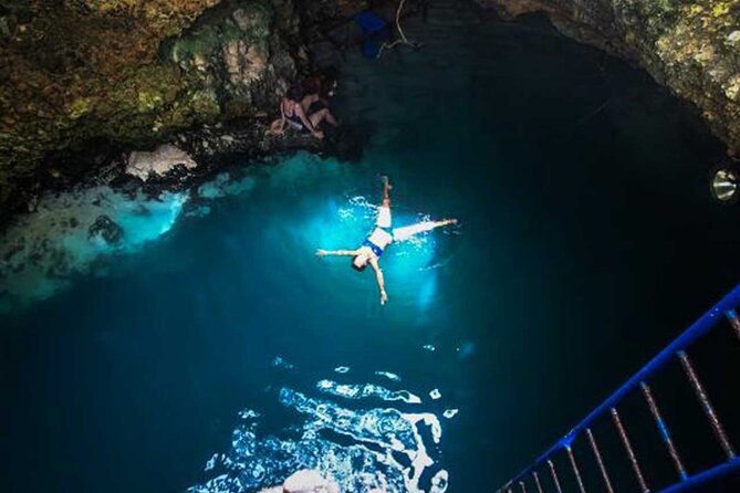 Parasailing, Blue Hole Mineral Spring, Seven Mile Beach - Blue Hole Mineral Spring and its 55-foot leap