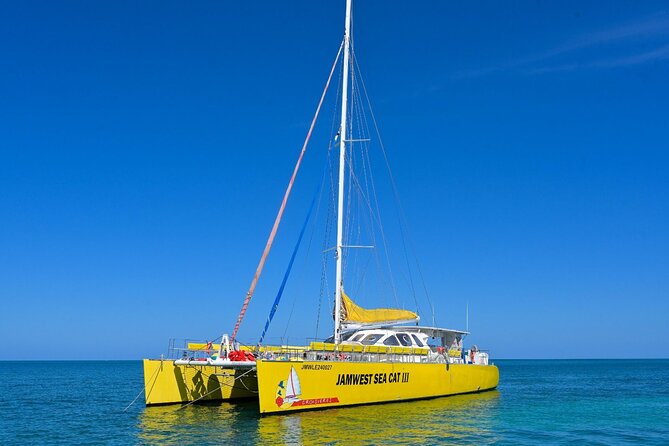Party Catamaran Sunset Ricks Cafe Negril Open Bar and DJ - Rick’s Cafe, cliff jumps, and sunset views
