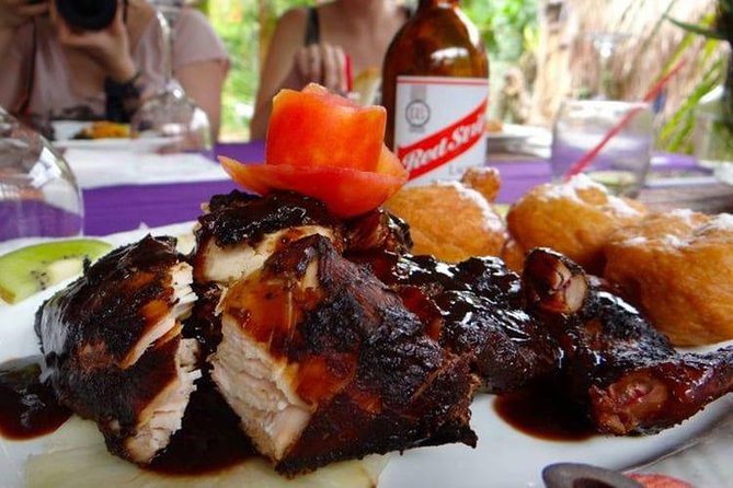 Private Round Trip Transfer for Jamaican Jerk at Scotchie's Ocho Rios - Drivers can add local color to a simple meal stop