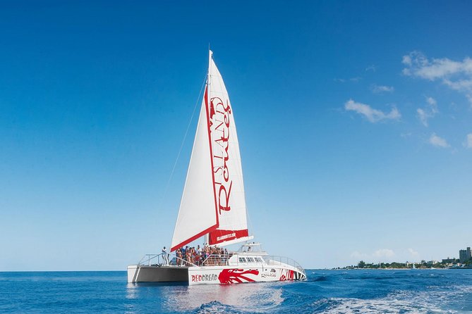 Reggae Family Catamaran Cruise From Montego Bay - Snorkeling near Doctor’s Cave Beach
