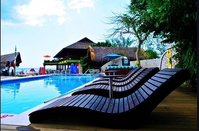 Rick's Cafe and 7 Mile Beach from Montego Bay - My call: book it for a taste of Negril
