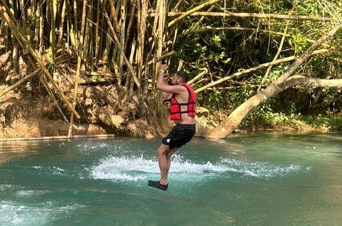 River Rapids Tubing and Beach Visit with Private Transportation - Kayaking toward the nearby beach
