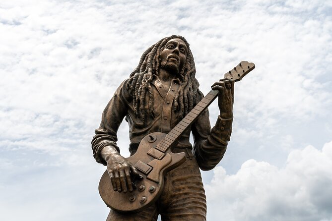 The Essential Bob Marley Tour: Visit His Home and more - Kingston murals and a short city walk