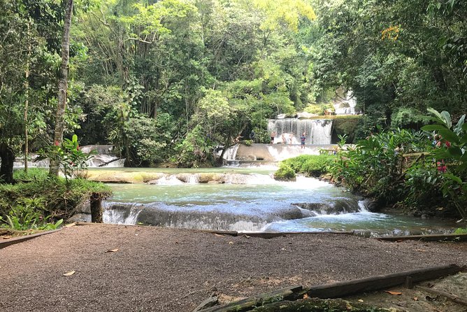 YS Falls Private Full-Day Adventure Tour with Pickup - Arriving at the ticket office and taking the jitney